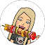 Shelli Cotton cartoon avatar enjoying a skewer of grilled food, emphasizing a fun and casual dining experience.