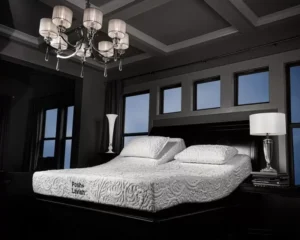 Avocado Green Box Top mattress in a stylish bedroom setting, featuring adjustable split head design, elegant chandelier, and modern decor elements.