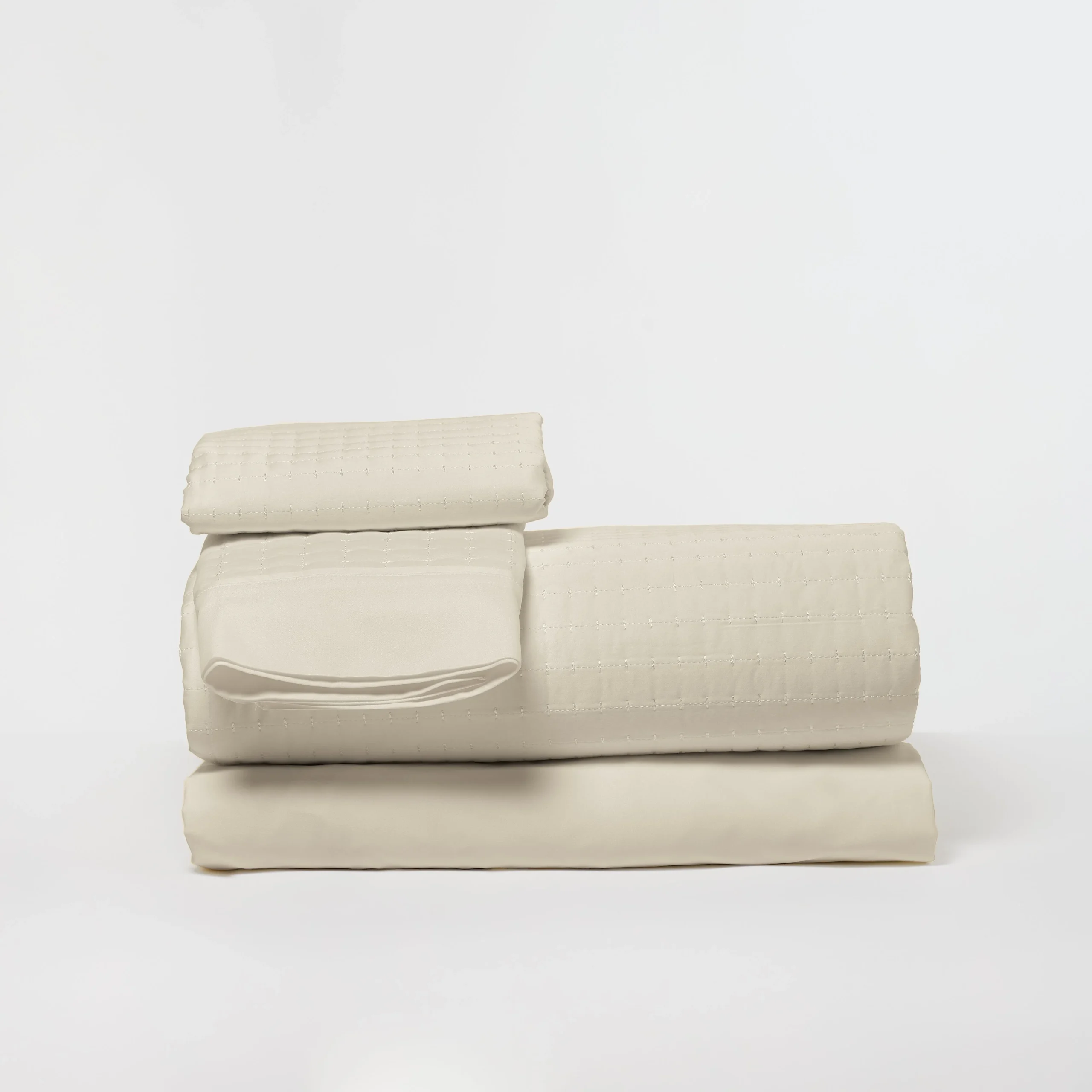 Quilted Enhanced Bamboo mattress cover showcasing soft, moisture-wicking fabric in neutral tones, designed for comfort and cooling.